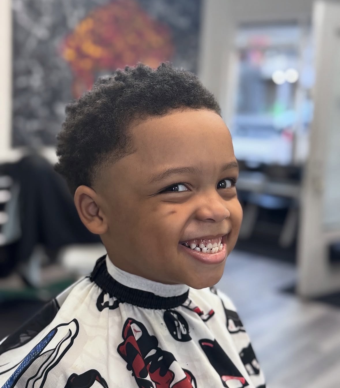 Happy young client with a fresh cut at Tony Cutz